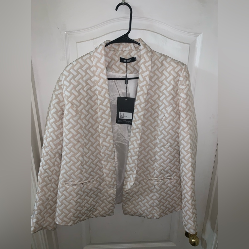 Two piece set. Blazer and suit shorts. Never worn.